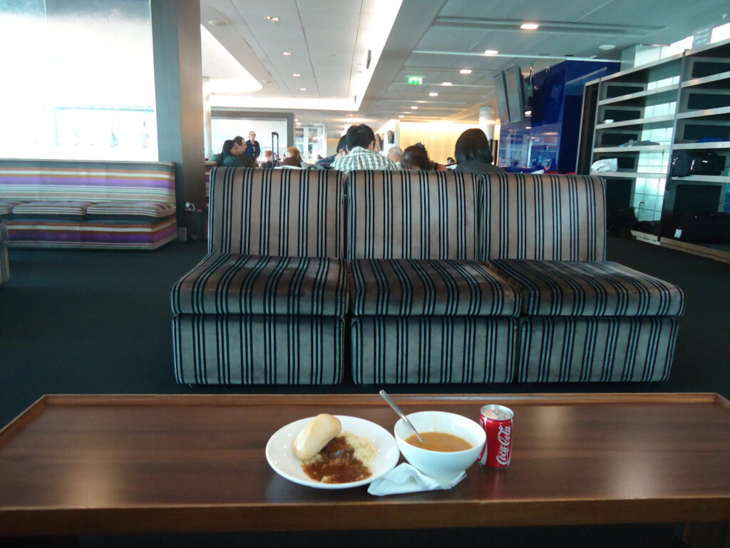 Blue striped couch at the British Airways lounge in London