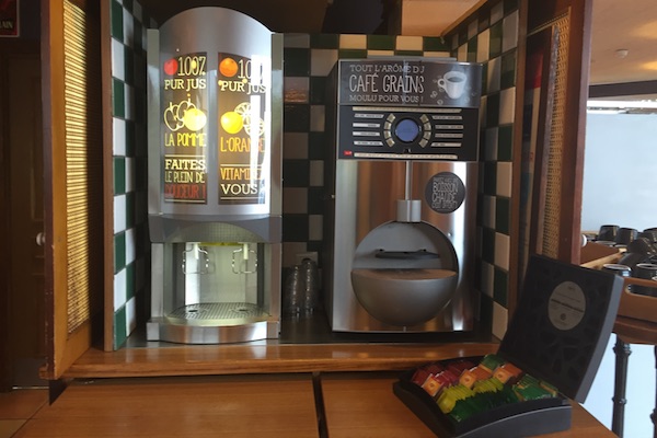 Coffee and juice dispenser at the Hotel Ibis Calais breakfast buffet