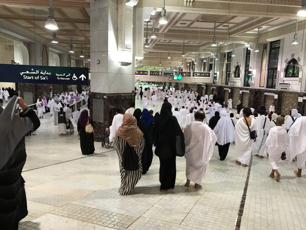 Pilgrims walking between Safa and Marwa inside Masjid Al Haram in Mecca