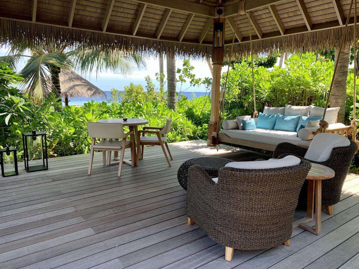 Waldorf Astoria Maldives beach villa outdoor deck seating