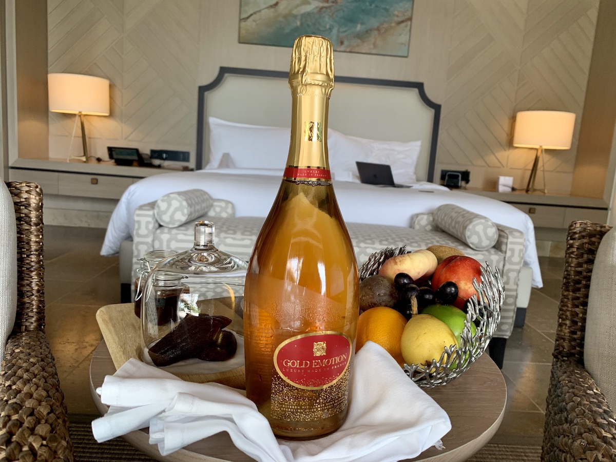 Hilton Diamond member amenity fruits and sparkling apple juice with gold flecks