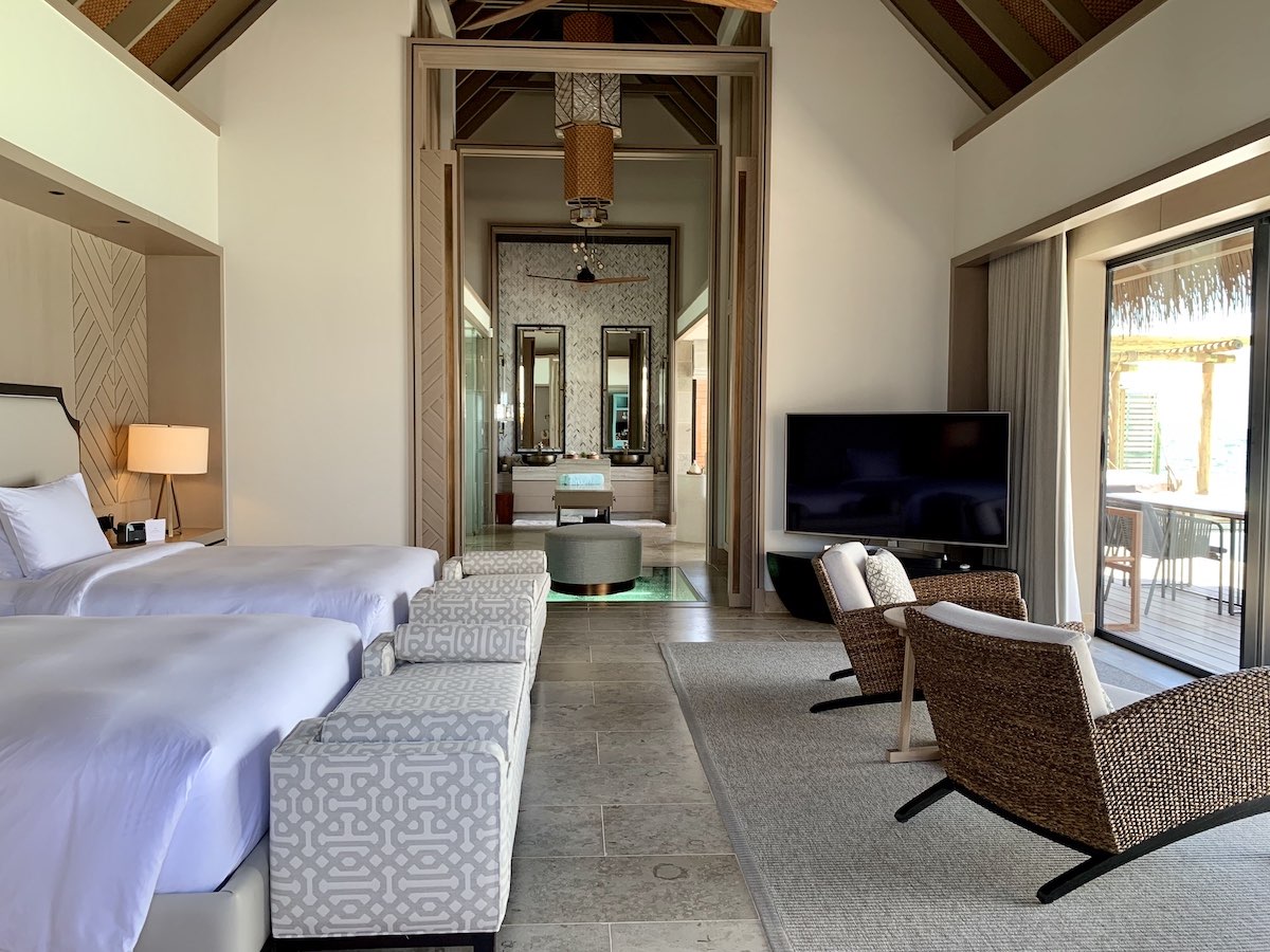 Waldorf Astoria Maldives overwater villa queen beds