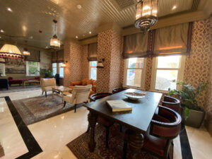 Plush seating area in an ornately-decorated hotel lobby