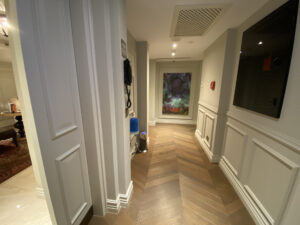 Townhouse entryway with herringbone floors