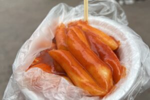 A bowl of korean rice cakes with sauce