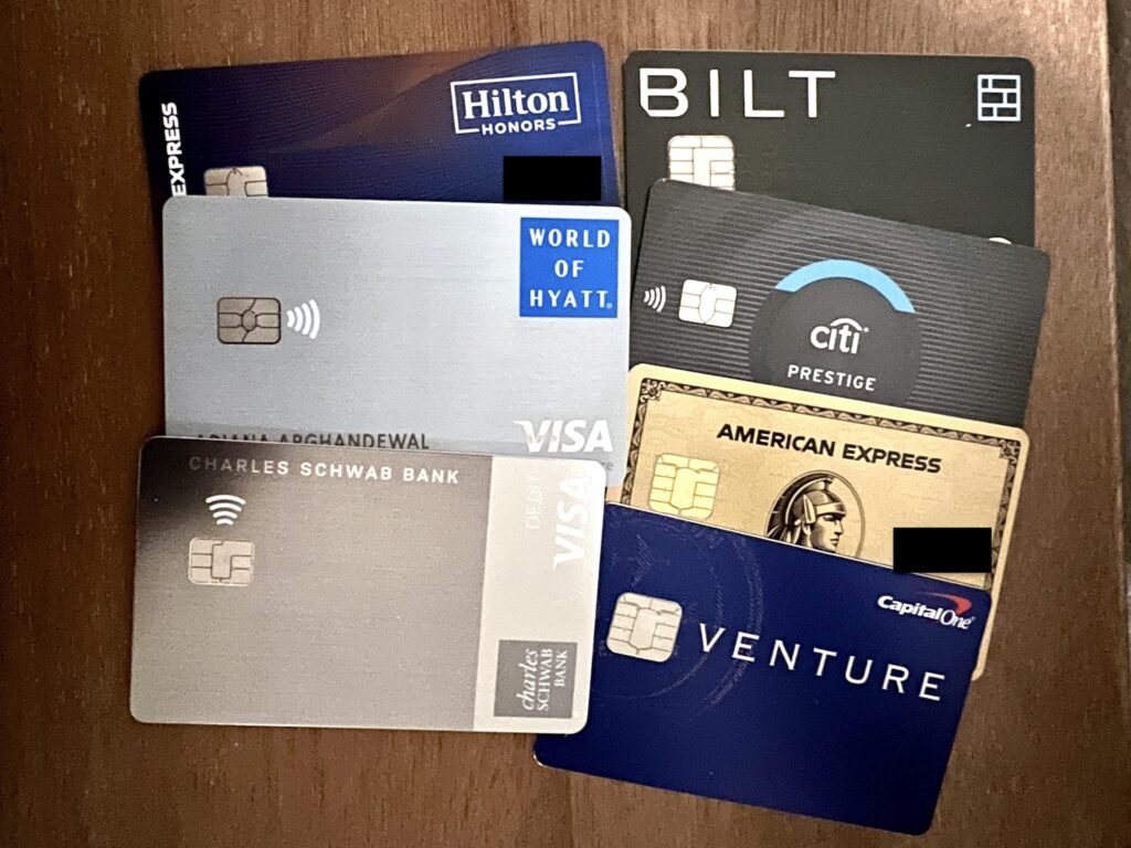 Eight credit cards laid out on a table