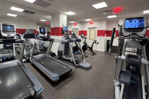 Treadmills and Peloton bikes at the 50 bowery hotel gym